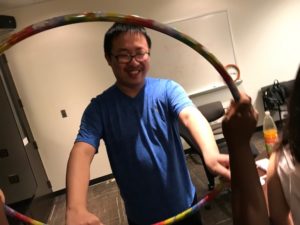Picture of guy holding hula hoop